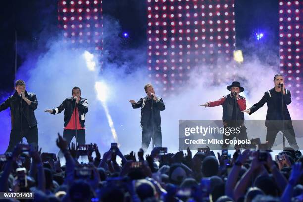 Nick Carter, Howie Dorough, Brian Littrell, AJ McLean and Kevin Richardson of Backstreet Boys perform onstage at the 2018 CMT Music Awards at...