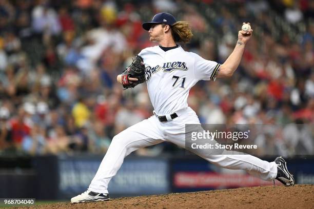 Josh Hader of the Milwaukee Brewers throws a pitch during a game against the St. Louis Cardinals at Miller Park on May 30, 2018 in Milwaukee,...