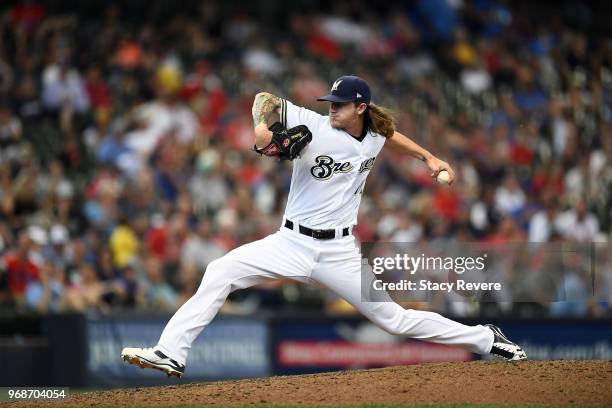 Josh Hader of the Milwaukee Brewers throws a pitch during a game against the St. Louis Cardinals at Miller Park on May 30, 2018 in Milwaukee,...