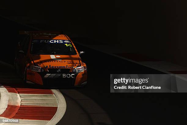 Jason Bright drives the Trading Post Racing Holden during qualifying for round one of the V8 Supercar Championship Series at Yas Marina Circuit on...
