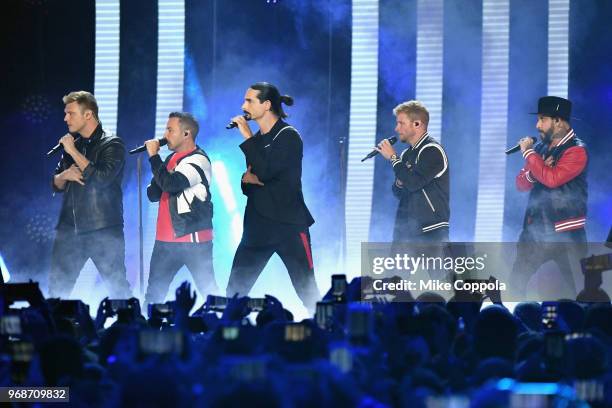 Nick Carter, Howie Dorough, Kevin Richardson, Brian Littrell and AJ McLean of Backstreet Boys perform onstage at the 2018 CMT Music Awards at...