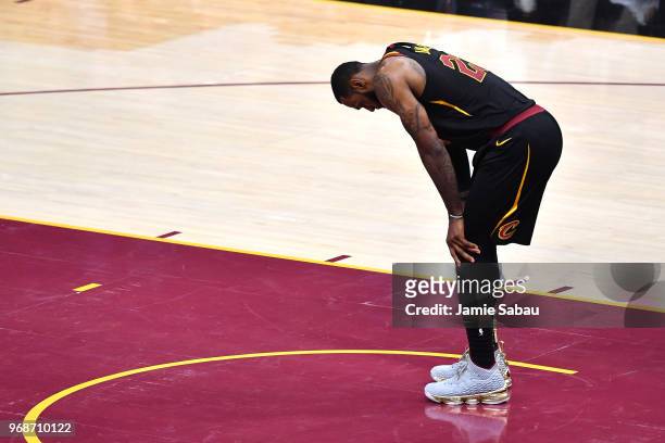 LeBron James of the Cleveland Cavaliers reacts against the Golden State Warriors in the first half during Game Three of the 2018 NBA Finals at...