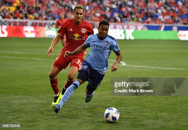 Jonathan Lewis of New York City FC looks to control the ball against in the New York Red Bulls in the first half during the fourth round match of the...