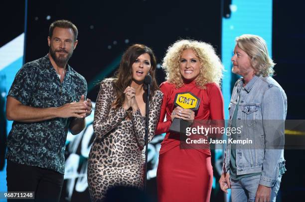 Jimi Westbrook, Karen Fairchild, Kimberly Schlapman and Philip Sweet of Little Big Town accept an award onstage at 2018 CMT Music Awards at...