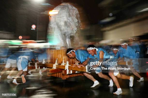 Shrine parishioners swing 'Bonten' floats during the 'Bonten Togyo' a part of the Agata Festival in front of Agata Jinja Shrine on June 6, 2018 in...