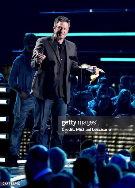 Blake Shelton speaks onstage at the 2018 CMT Music Awards at Bridgestone Arena on June 6, 2018 in Nashville, Tennessee.