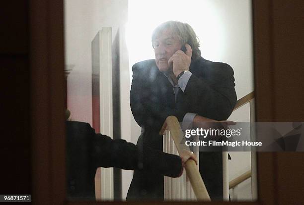 Actor Gerard Depardieu speaks on his phone after he attended the 'Mammuth' Photocall during day nine of the 60th Berlin International Film Festival...