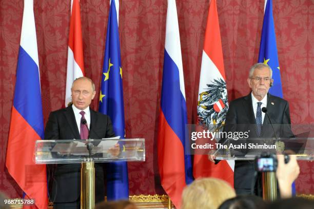 Russian President Vladimir Putin attends a joint press conference after his meeting with Austrian President Alexander van der Bellen at Hofburg...