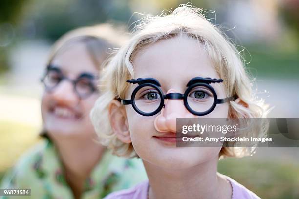 funny faced girls - groucho marx disguise stock pictures, royalty-free photos & images