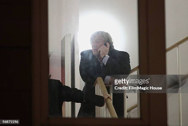 Actor Gerard Depardieu speaks on his phone after he attended the 'Mammuth' Photocall during day nine of the 60th Berlin International Film Festival...