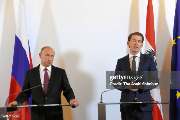 Russian President Vladimir Putin and Austrian Chancellor Sebastian Kurz attend a joint press conference at Hofburg Palace on June 5, 2018 in Vienna,...