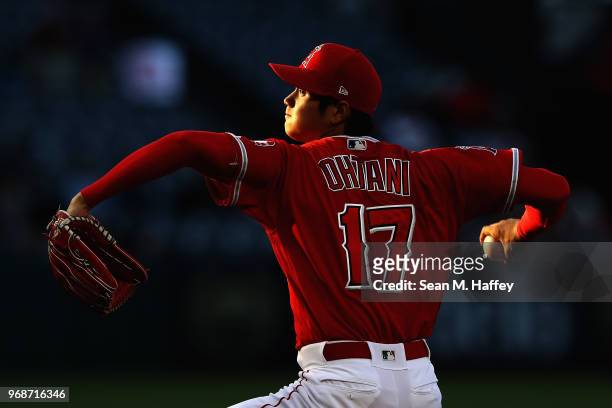 Shohei Ohtani of the Los Angeles Angels of Anaheim pitches during the first inning of a game against the Kansas City Royals at Angel Stadium on June...