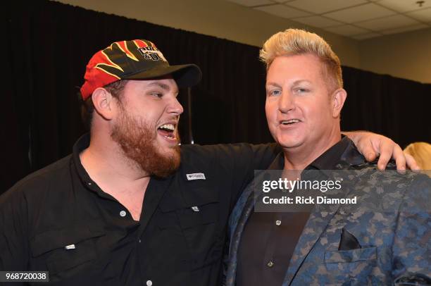 Luke Combs and Gary LeVox of musical group Rascal Flatts attend the 2018 CMT Music Awards - Backstage & Audience at Bridgestone Arena on June 6, 2018...