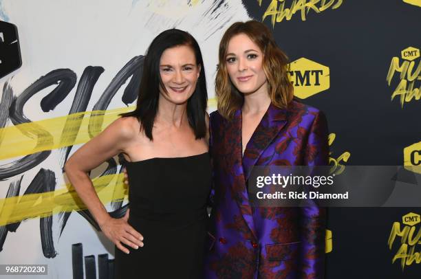 Senior VP of Music Strategy at CMT Leslie Fram and Jillian Jacqueline attend the 2018 CMT Music Awards at Bridgestone Arena on June 6, 2018 in...