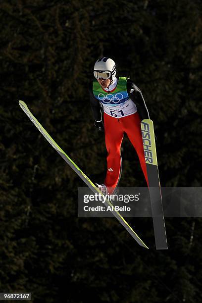 Simon Ammann of Switzerland soars off the Long Hill during the qualification round on day 8 of the 2010 Vancouver Winter Olympics at Ski Jumping...