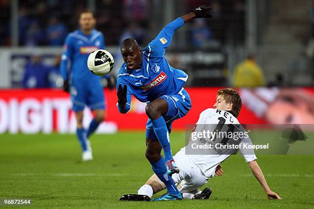 Marco Reus of Gladbach fouls Demba Ba of Hoffenheim during the Bundesliga match between 1899 Hoffenheim and Borussia Moenchengladbach at Rhein-Neckar...