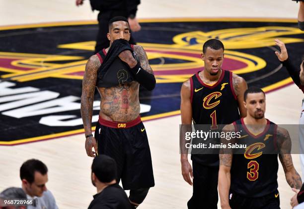 Smith, Rodney Hood and George Hill of the Cleveland Cavaliers reacts after falling to the Golden State Warriors in Game Three of the 2018 NBA Finals...