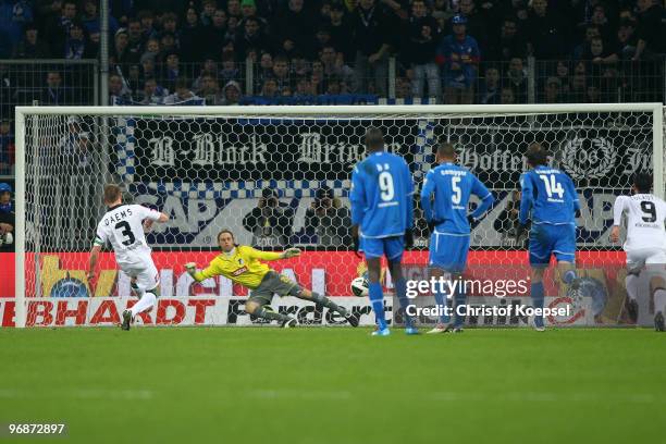 Filip Daems of Gladbach scores his team's first goal by penalty against goalkeeper Timo Hildebrand of Hoffenheim during the Bundesliga match between...