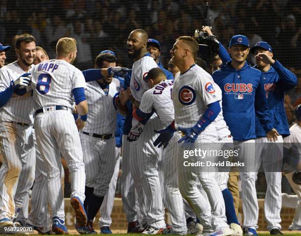 Jason Heyward of the Chicago Cubs hits a walk-off grand slam home run against the Philadelphia Phillies during the ninth inning on June 6, 2018 at...