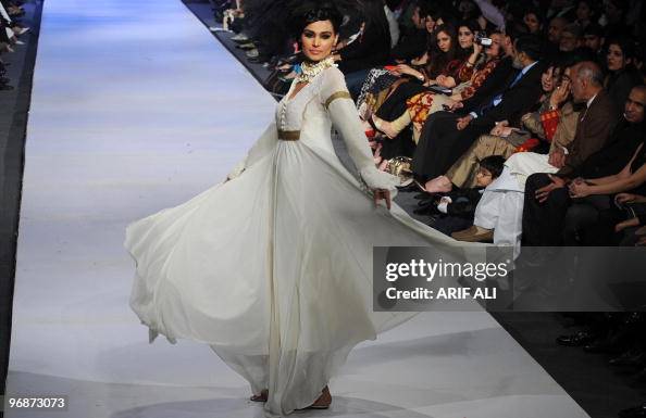 A model presents creations by Pakistani A model presents creations by Pakistani