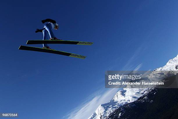 Stefan Hula of Poland soars off the Long Hill during the qualification round on day 8 of the 2010 Vancouver Winter Olympics at Ski Jumping Stadium on...