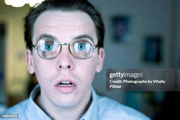 open mouth, wide eyed, nerdy thick glasses. - staring stockfoto's en -beelden