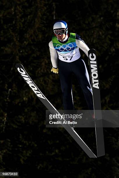 Wolfgang Loitzl of Austria soars off the Long Hill during the qualification round on day 8 of the 2010 Vancouver Winter Olympics at Ski Jumping...