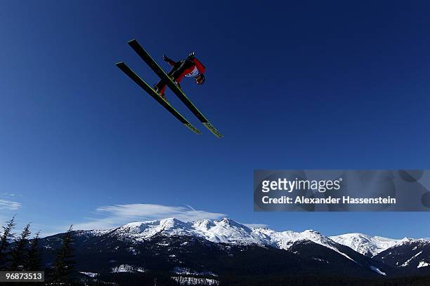 Andreas Wank of Germany soars off the Long Hill during the qualification round on day 8 of the 2010 Vancouver Winter Olympics at Ski Jumping Stadium...