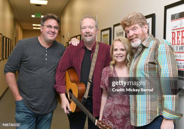 Singer/songwriters Vince Gill, Don Schlitz, Mary Chapin Carpenter and Mac McAnally pose for a photo backstage before CMA Songwriters Series Featuring...