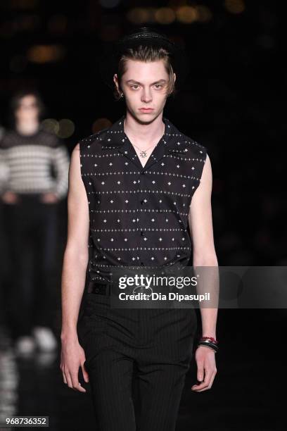 Model walks the runway at the Saint Laurent Resort 2019 Runway Show on June 6, 2018 in New York City.