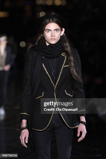 Model walks the runway at the Saint Laurent Resort 2019 Runway Show on June 6, 2018 in New York City.