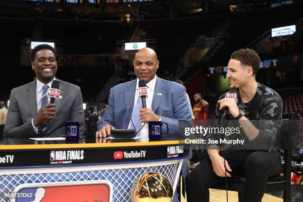 Chris Webber and Charles Barkley speak to Klay Thompson of the Golden State Warriors after Game Three of the 2018 NBA Finals against the Cleveland...