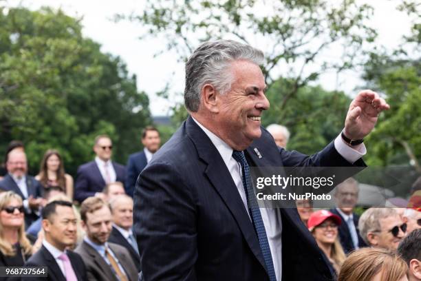 Congressman Peter King stands as he's acknowledged at a ceremony where U.S. President Donald Trump signs S. 2372, the VA Mission Act of 2018 in the...