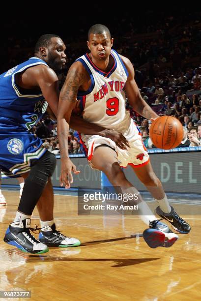 Jonathan Bender of the New York Knicks drives against Al Jefferson of the Minnesota Timberwolves during the game on January 26, 2010 at Madison...