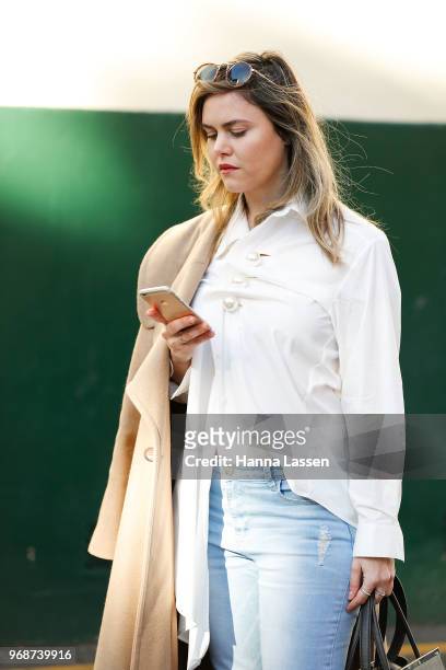 Designer Vanessa Moe wearing Vanessa Moe coat, white shirt, Marks and Spencer jeans, Fendi bag, Zara shoes and Linda Farrow sunglasses on June 7,...