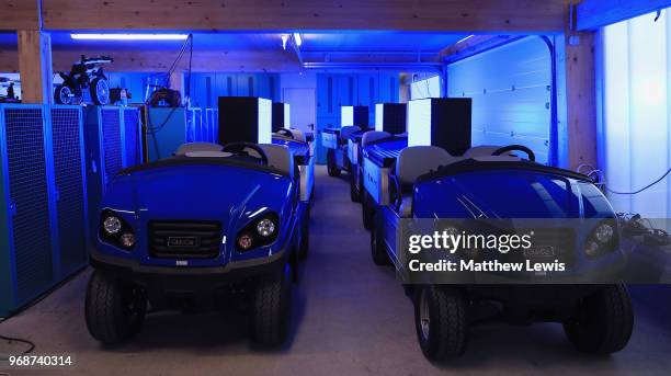 Golf buggies with electronic displays charge up ahead of the Pro-Am of The 2018 Shot Clock Masters at Diamond Country Club on June 6, 2018 in...