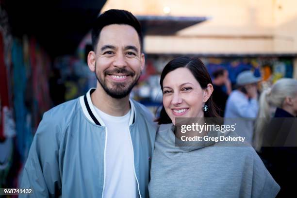 Linkin Park Member Mike Shinoda and his wife Anna Shinoda attend the Adidas x Shepard Fairey Footwear Release on June 6, 2018 in Los Angeles,...