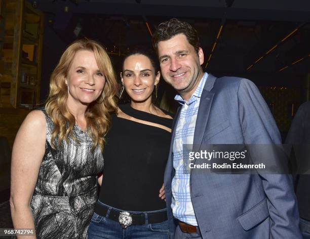 Director/actress Lea Thompson, Nadina Szew, and MarVista Entertainment CEO Fernando Szew pose for portrait at the premiere of MarVista...