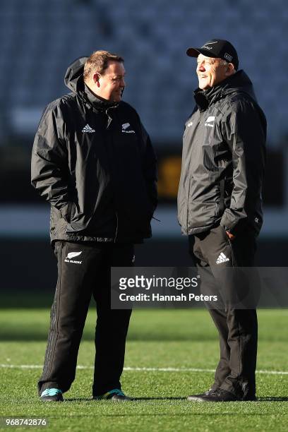 Head coach Steve Hansen shares a joke with Gilbert Enoka during a New Zealand All Blacks training session on June 7, 2018 in Auckland, New Zealand.