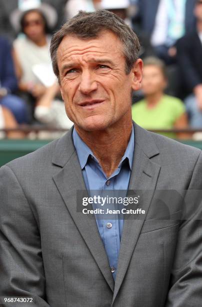 Mats Wilander receives on court a trophy for his 3 titles at the French Open during Day 11 of the 2018 French Open at Roland Garros stadium on June...