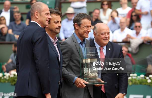 Guy Forget, Director of the French Open, Henri Leconte, Mats Wilander who receives a trophy for his 3 titles at the French Open, Bernard Giudicelli,...