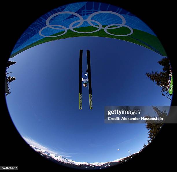 Stefan Hula of Poland soars off the Long Hill during the qualification round on day 8 of the 2010 Vancouver Winter Olympics at Ski Jumping Stadium on...