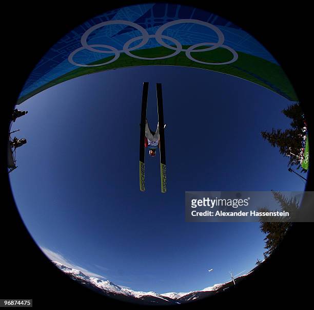 Taku Takeuchi of Japan soars off the Long Hill during the qualification round on day 8 of the 2010 Vancouver Winter Olympics at Ski Jumping Stadium...