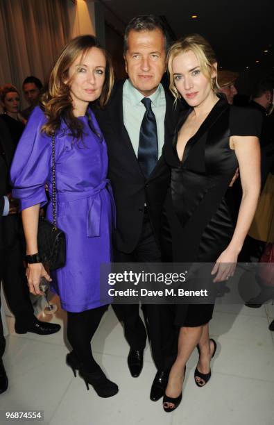 Lucy Yeomans, Kate Winslet and Mario Testino attend the Lancome and Harper's Bazaar Pre-BAFTA Party co-hosted by actress Kate Winslet, at St Martin's...