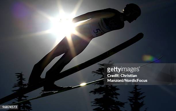 Michael Uhrmann of Germany soars off the Long Hill during the qualification round on day 8 of the 2010 Vancouver Winter Olympics at Ski Jumping...