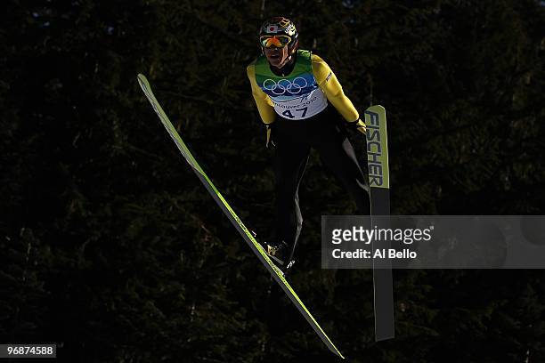 Noriaki Kasai of Japan soars off the Long Hill during the qualification round on day 8 of the 2010 Vancouver Winter Olympics at Ski Jumping Stadium...