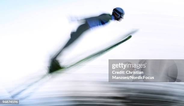 Michael Uhrmann of Germany soars off the Long Hill during the qualification round on day 8 of the 2010 Vancouver Winter Olympics at Ski Jumping...