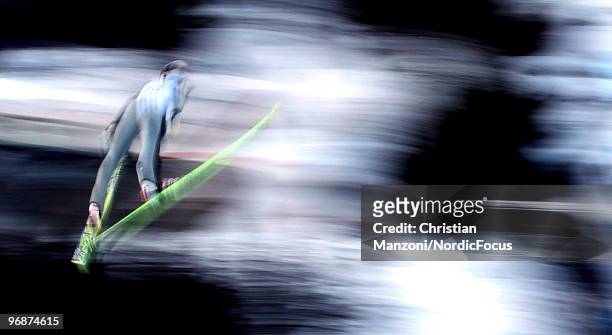 Gregor Schlierenzauer of Austria soars off the Long Hill during the qualification round on day 8 of the 2010 Vancouver Winter Olympics at Ski Jumping...