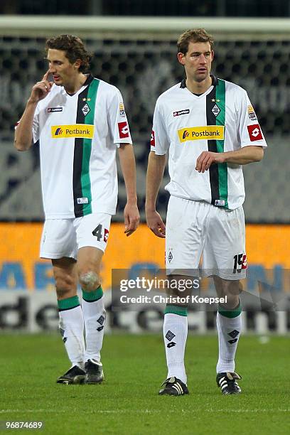 Roel Brouwers of Gladbach and Thomas Kleine of Gladbach look dejected after receiving the second goal during the Bundesliga match between 1899...