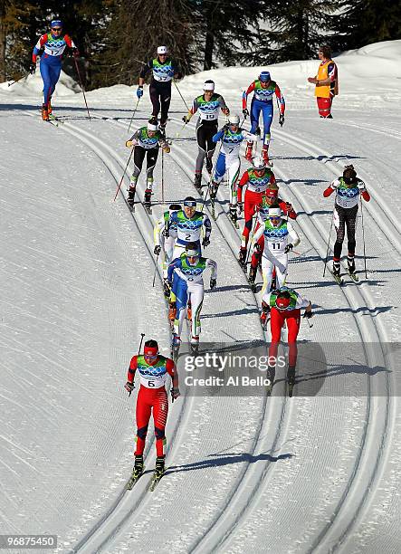 Marit Bjoergen of Norway skies in the lead during the Ladies' 15 km Pursuit on day 8 of the 2010 Vancouver Winter Olympics at Whistler Olympic Park...